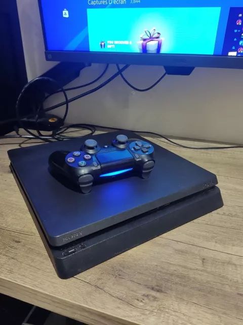 PlayStation 4 slim avec 2 manettes sans CD 1Tb Mémoire